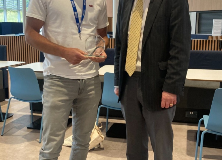 Mr Xenophontos collecting an award for being a Teaching champion winner