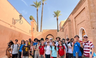 students in a market in Morocco