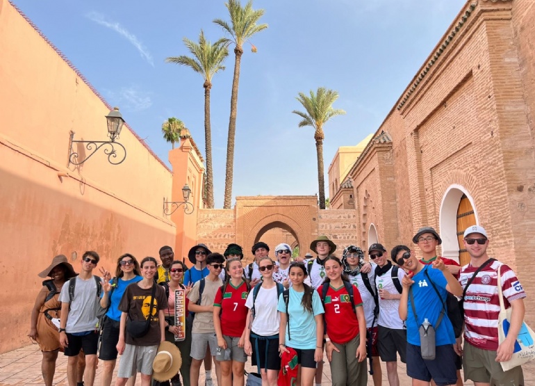 students in a market in Morocco