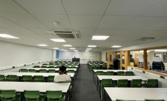 sixth form study area, row of desks and chairs