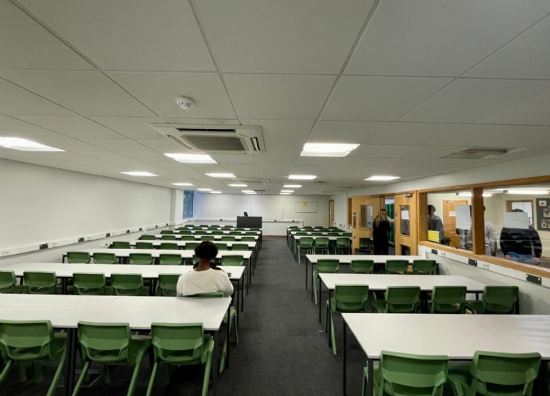 sixth form study area, row of desks and chairs